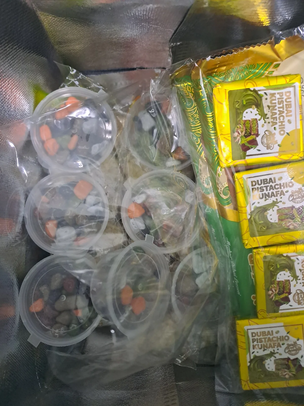 Kunafa chocolates and pebble sweets packed for families