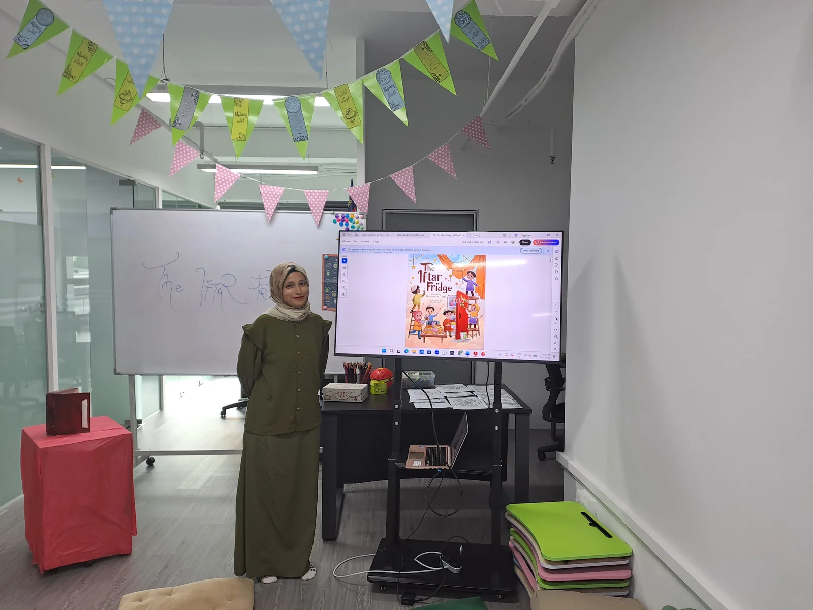 Director Mays with The Iftar Fridge on the screen
